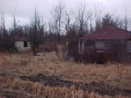 Remains of old tourist cabins and office on Route 26, just inside Alexandria Bay village limits.